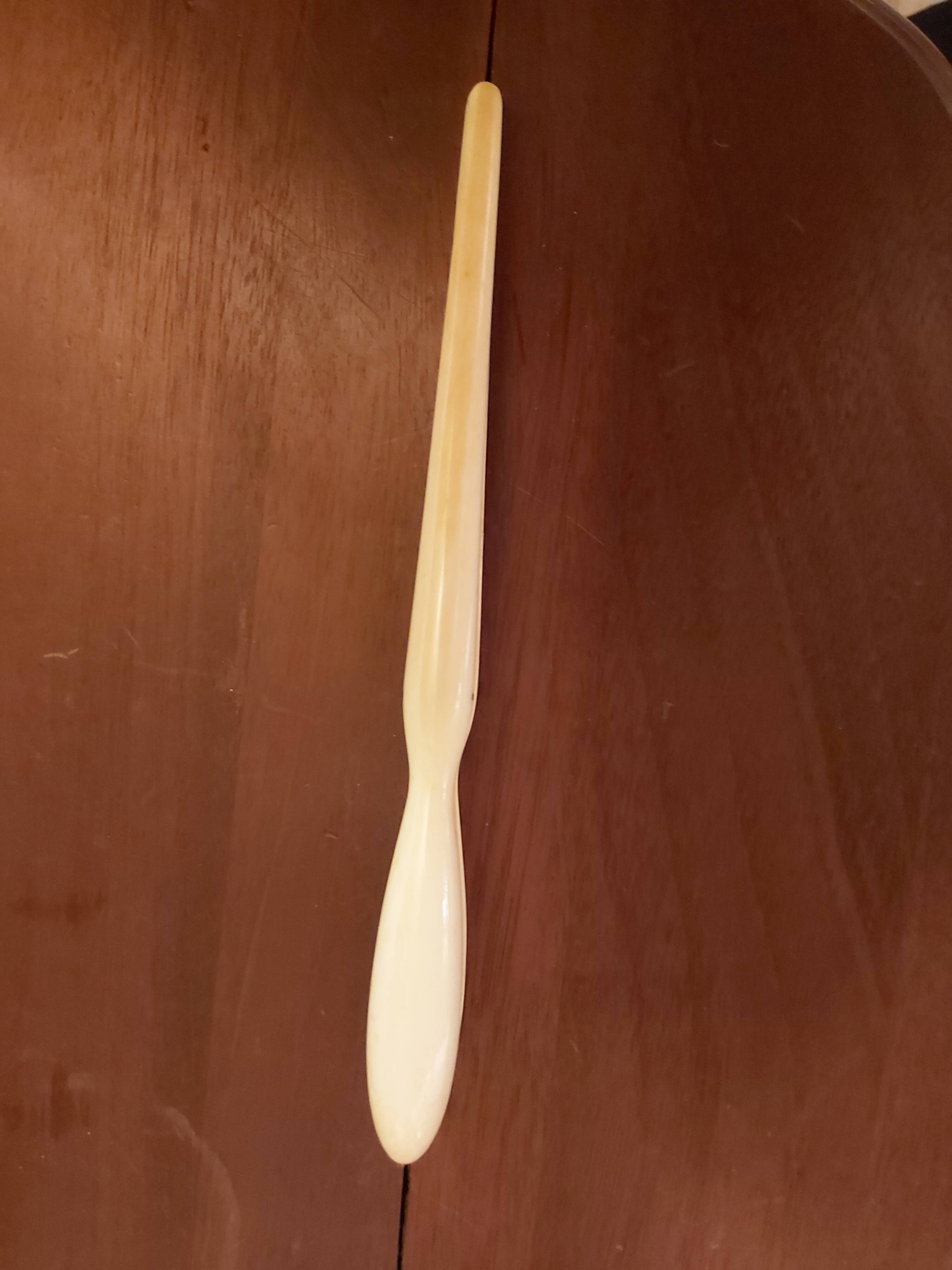 Ivory and silver glove clips