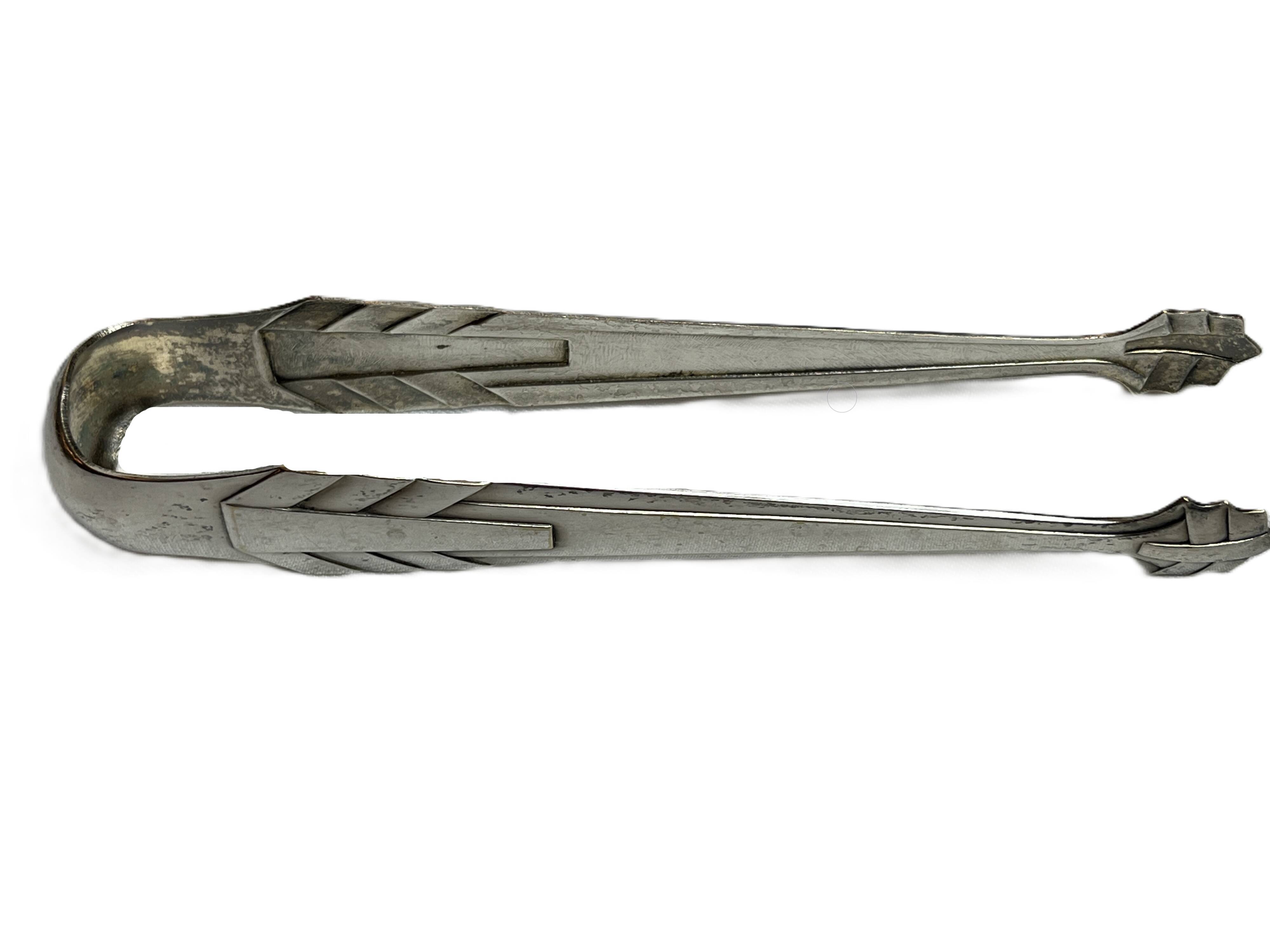 Art Deco, silver-plated sugar tongs from around 1930.