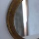 Antique round brass mirror