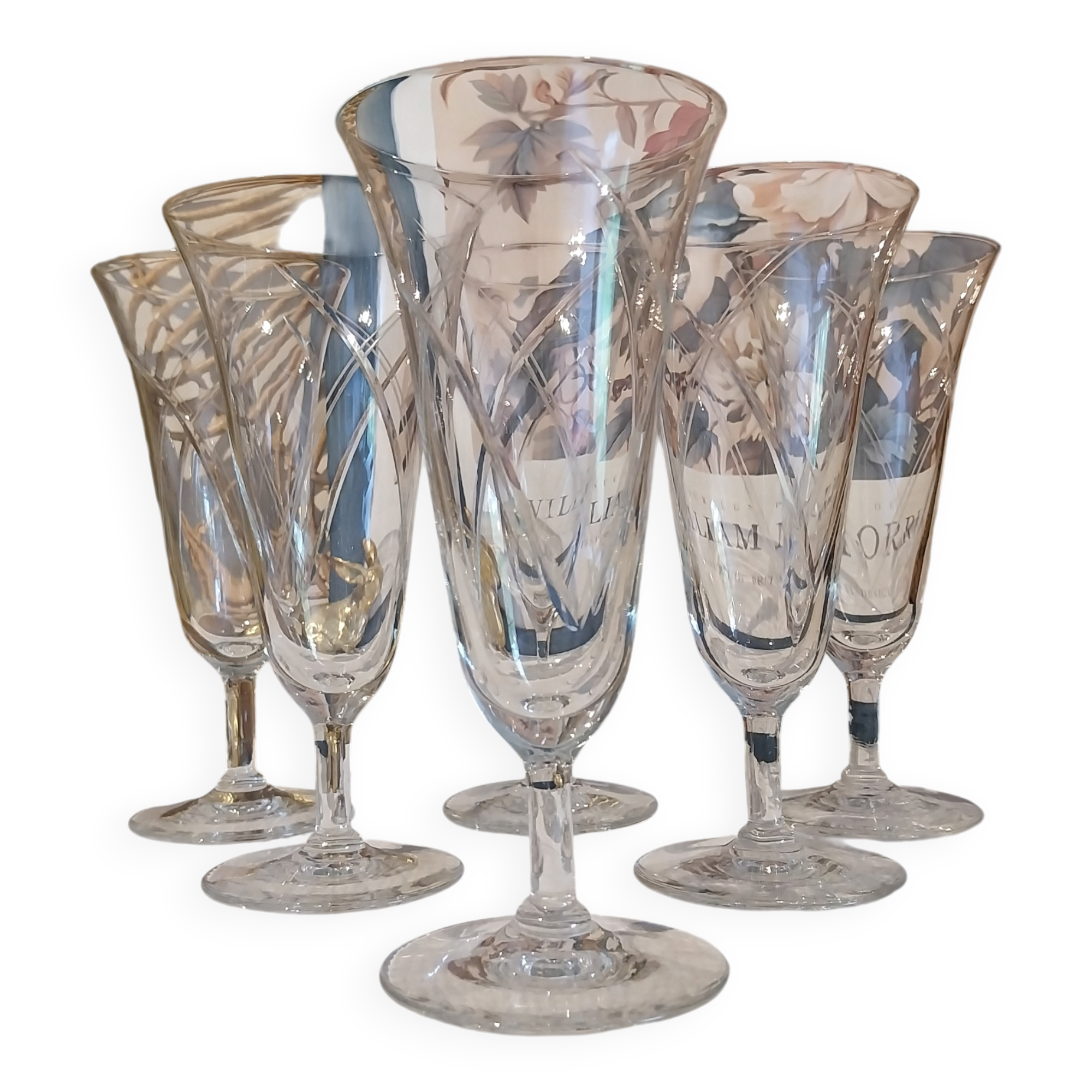 Old engraved crystal champagne flutes