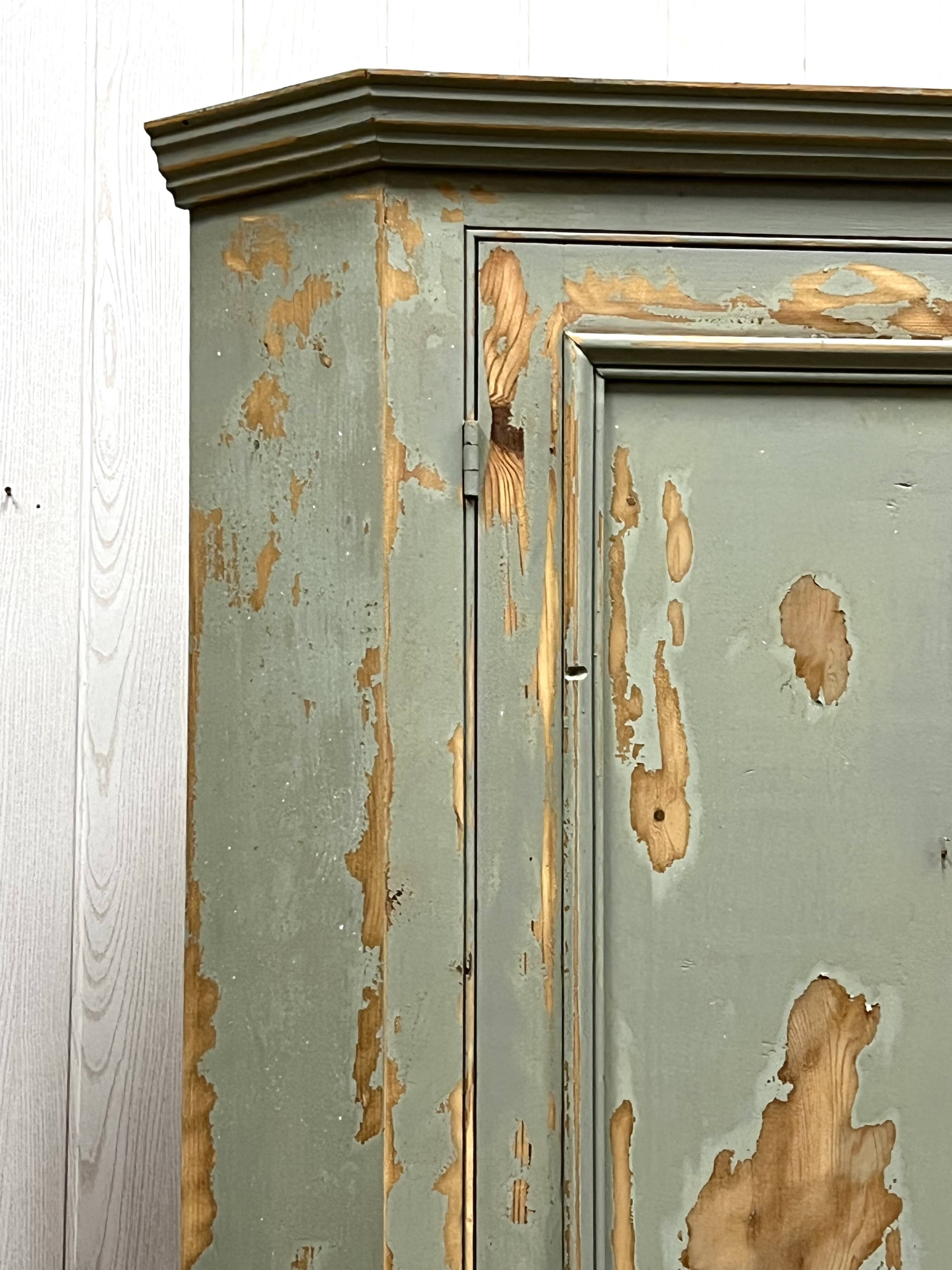 Patinated corner cupboard