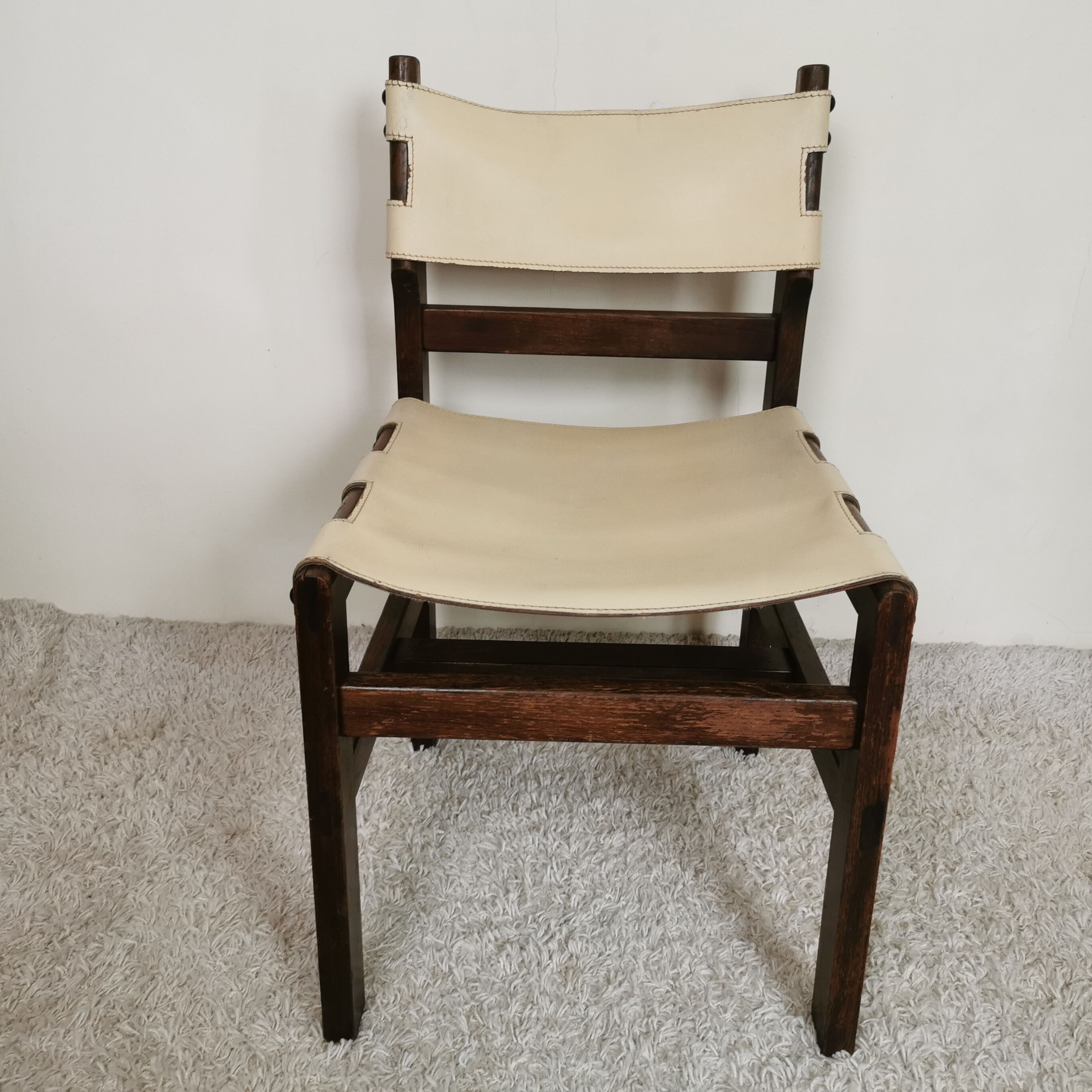 Series of 4 wooden and leather chairs