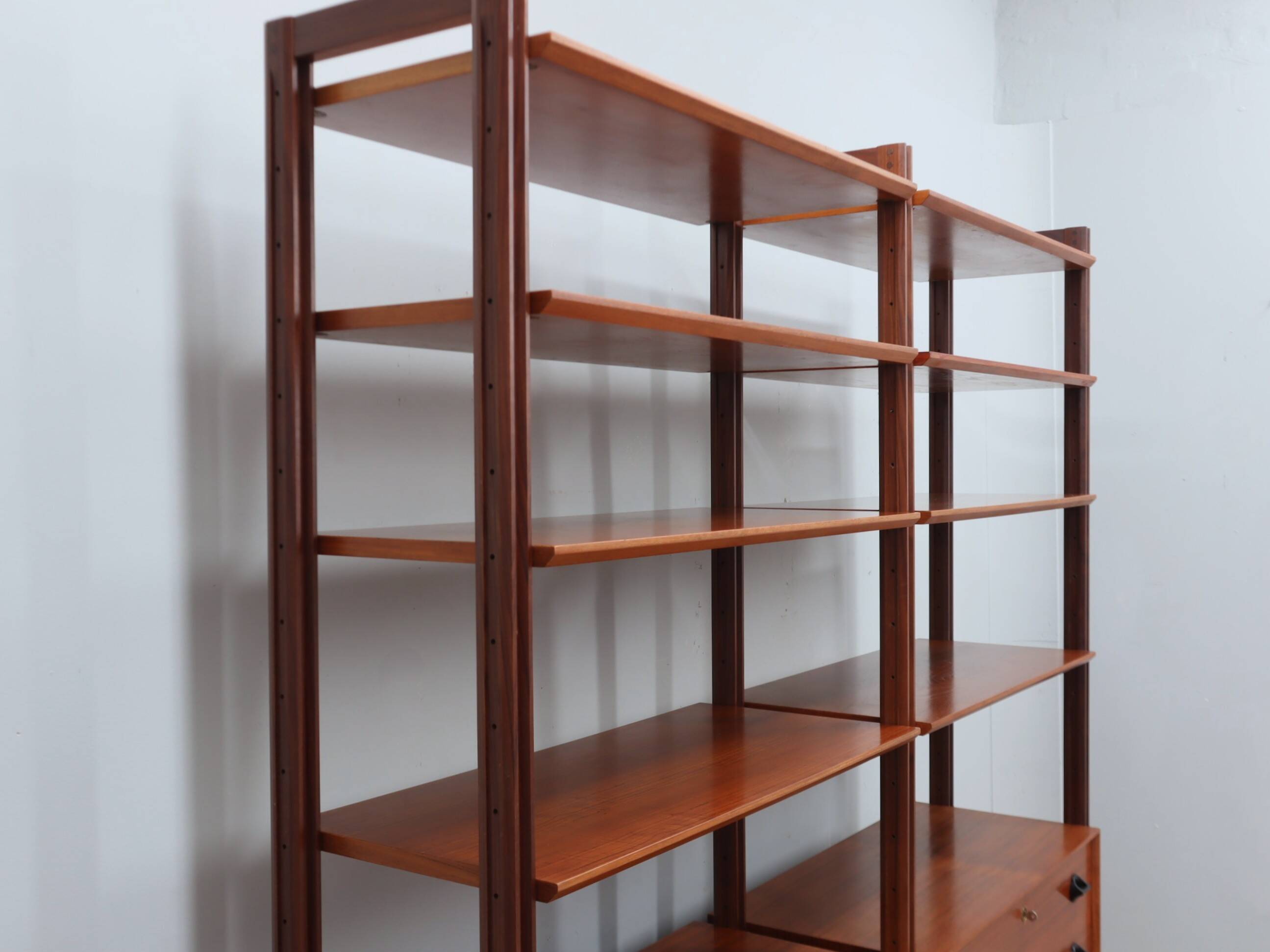 Mid-century modular teak bookcase with drawers and shelves Italy 1960s