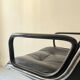 Black leather office chair and armrest by Charles Pollock for Knoll International