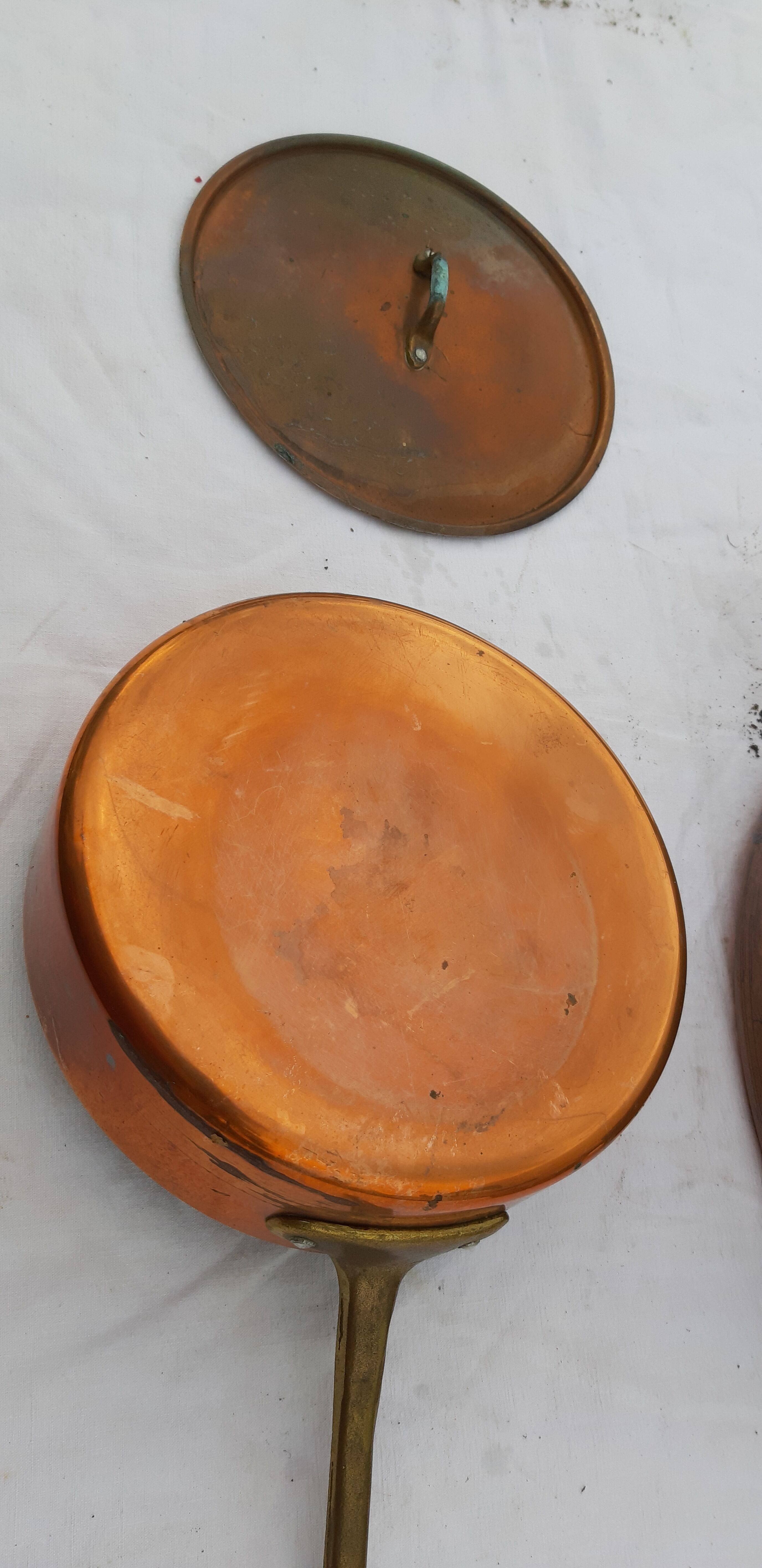 Lots of tinned copper kitchen utensils