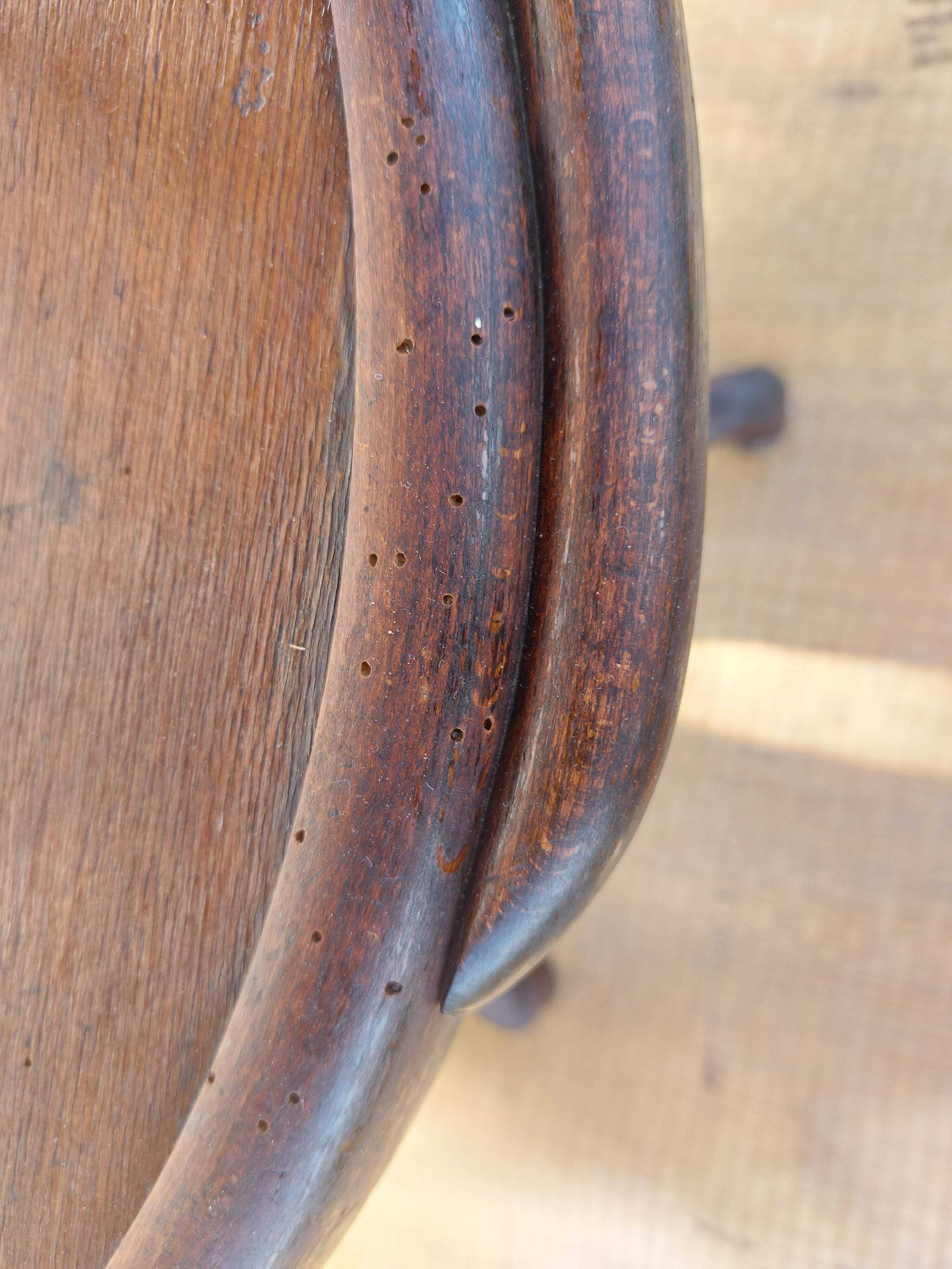 Swivel wooden armchair, pattern on seat