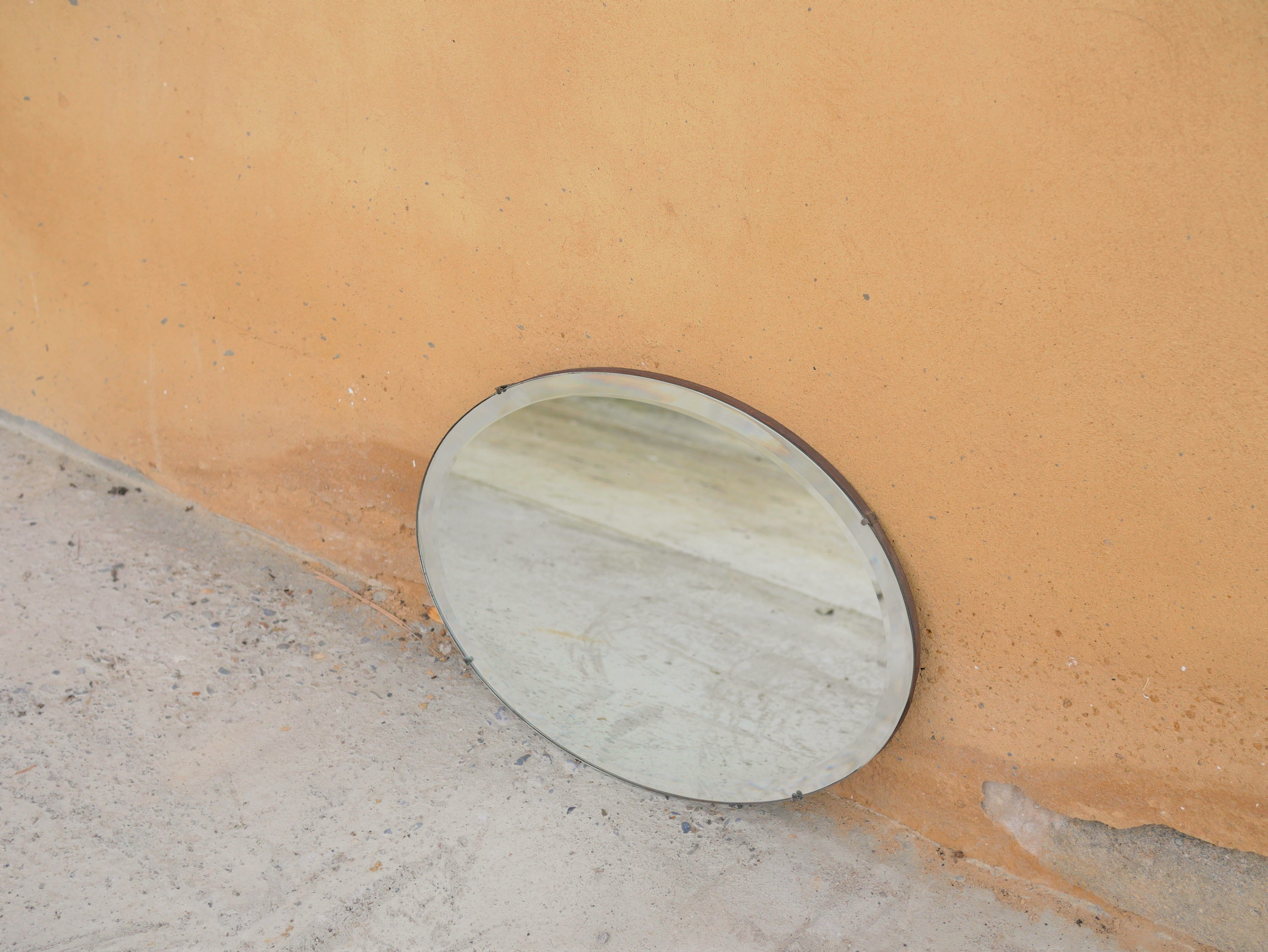 Vintage art deco bevelled oval mirror