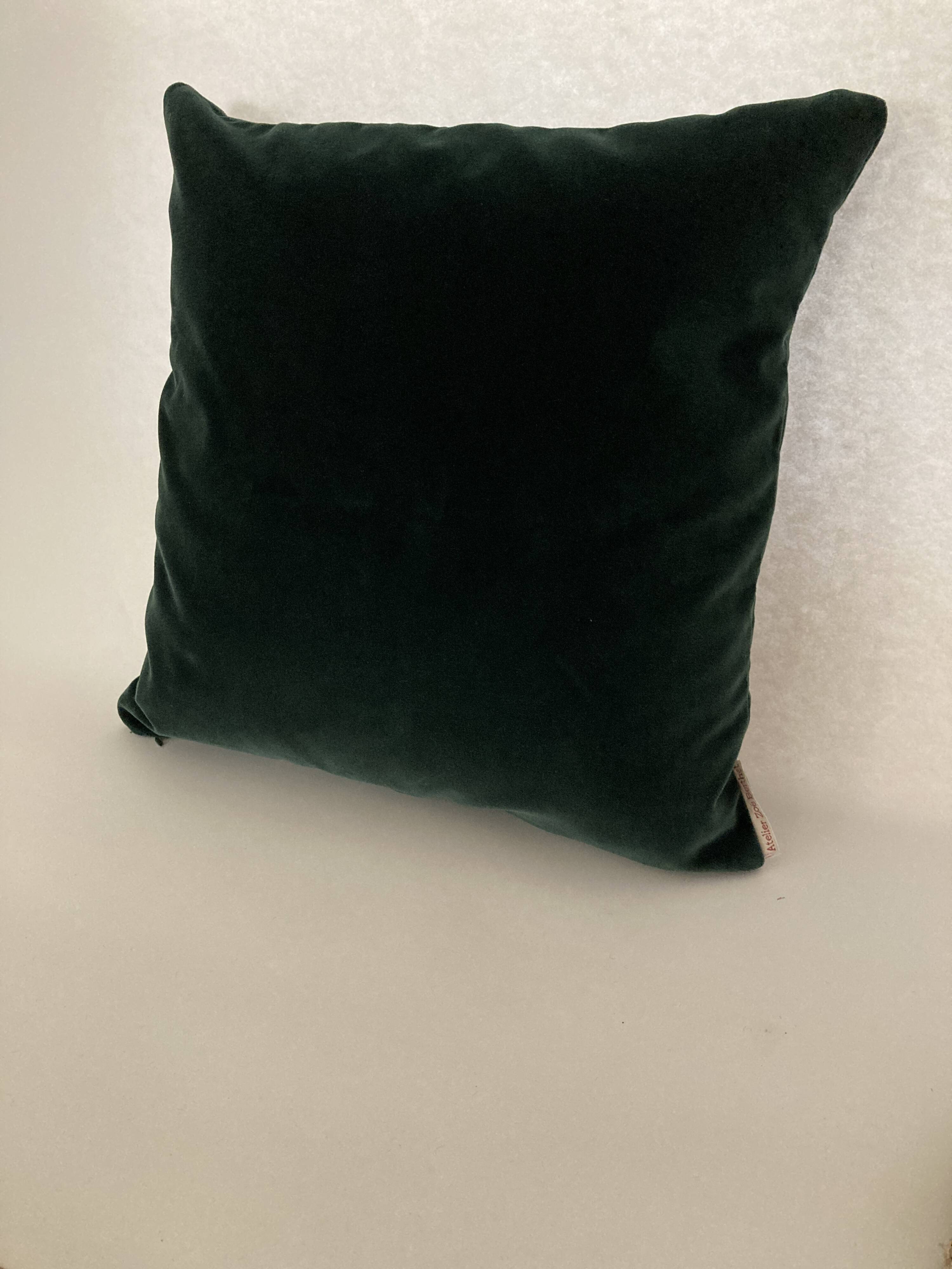 Forest green velvet cushion