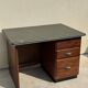Modernist desk in wood and green moleskin upholstery