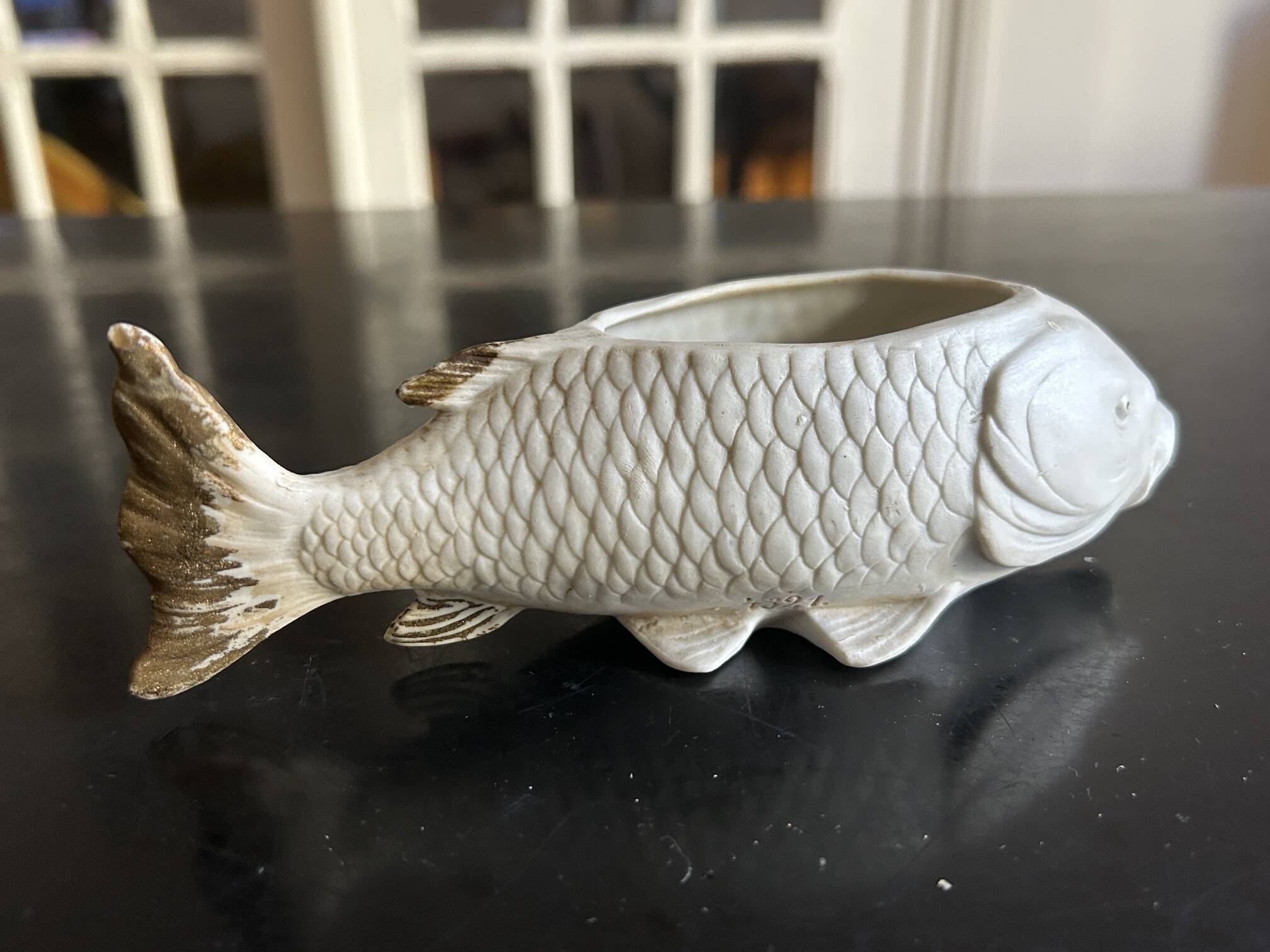 fish pocket ashtray in biscuit Heubach & co