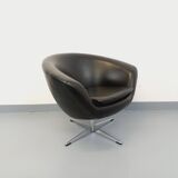 Vintage Scandinavian swivel chair in faux leather and chrome from the 1970s.