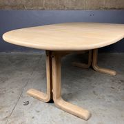 Oval extendable dining table in beech with Danish design.