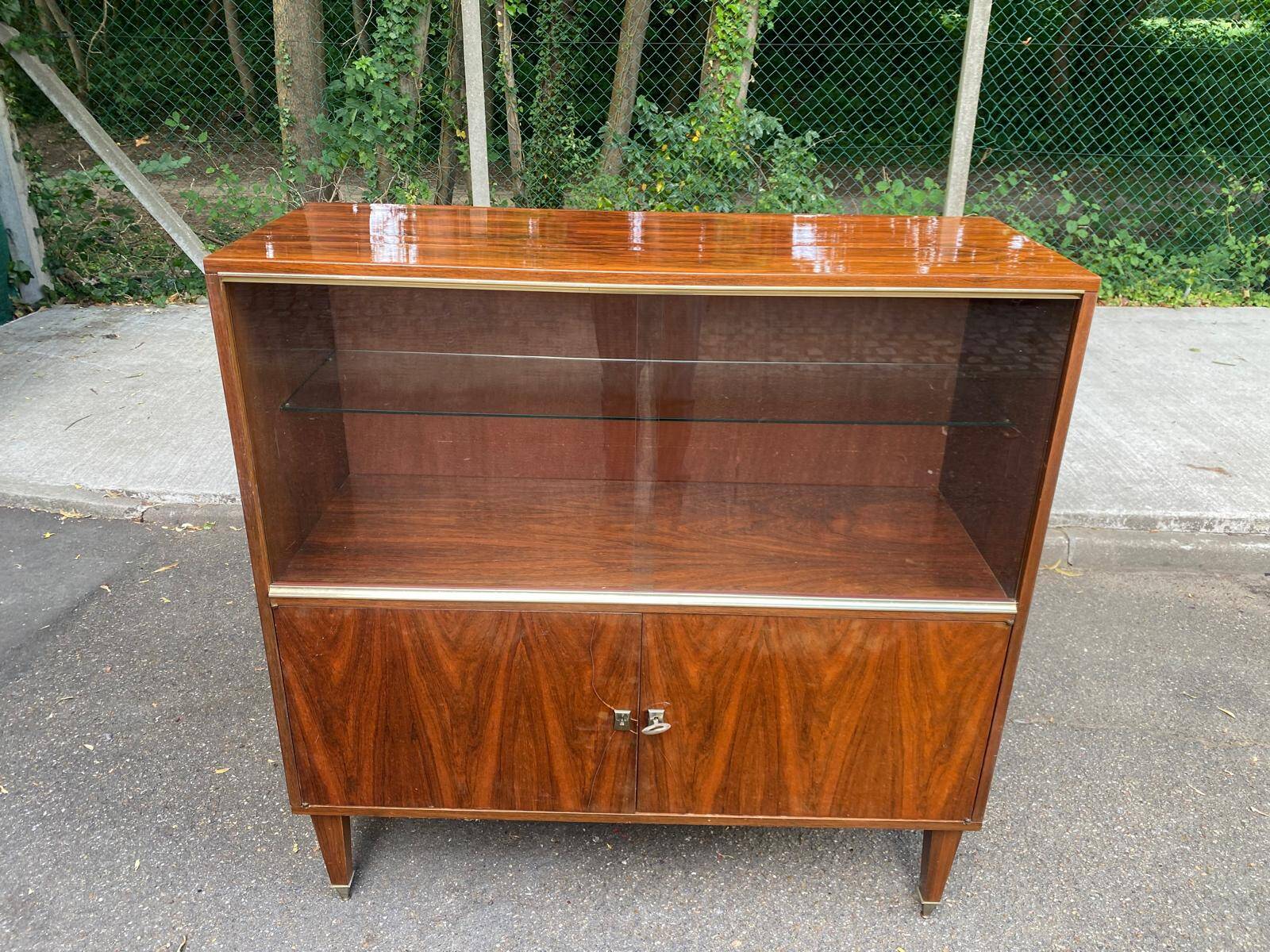 Scandinavian high buffet display cabinet in rosewood from the 1950s.