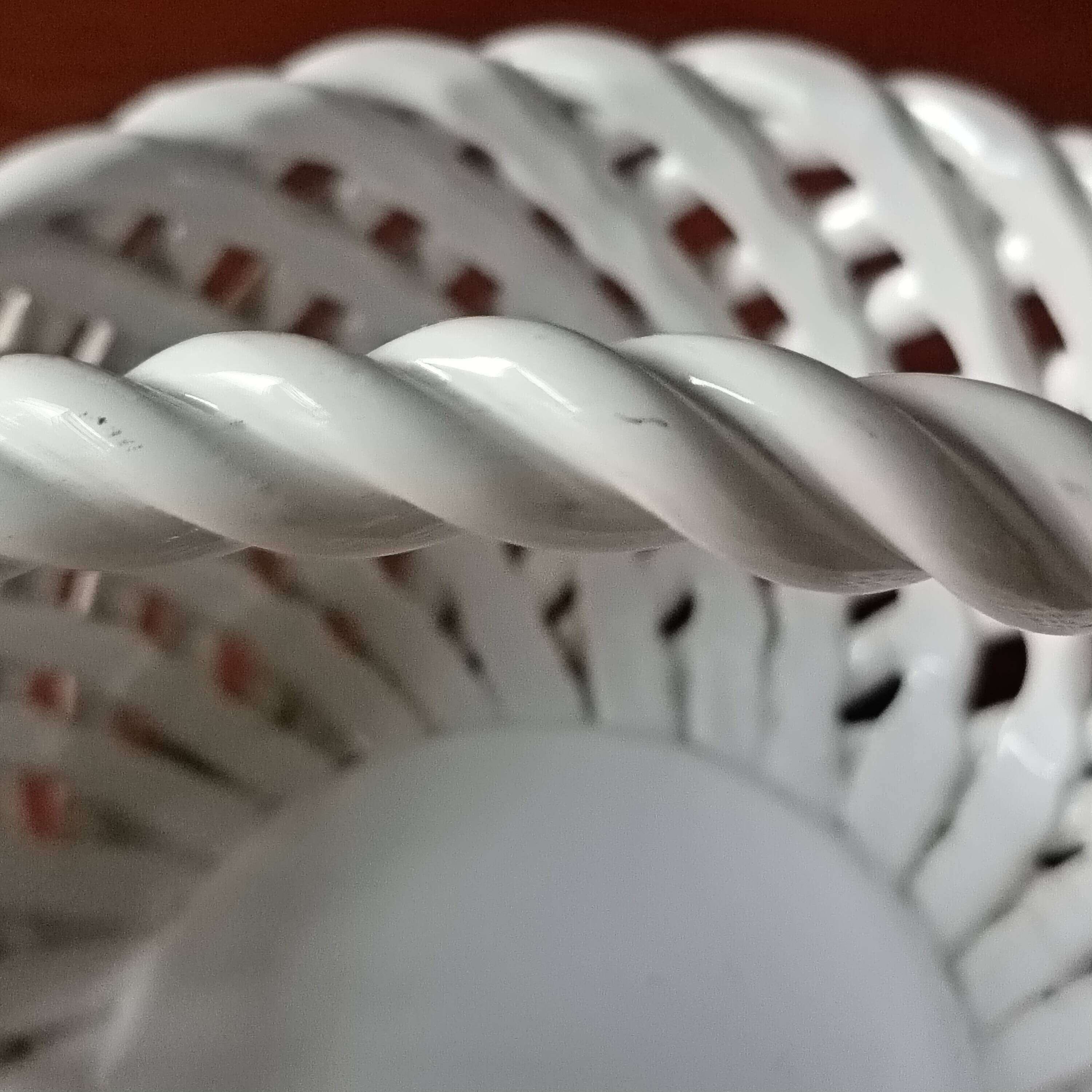 Small white twisted ceramic basket