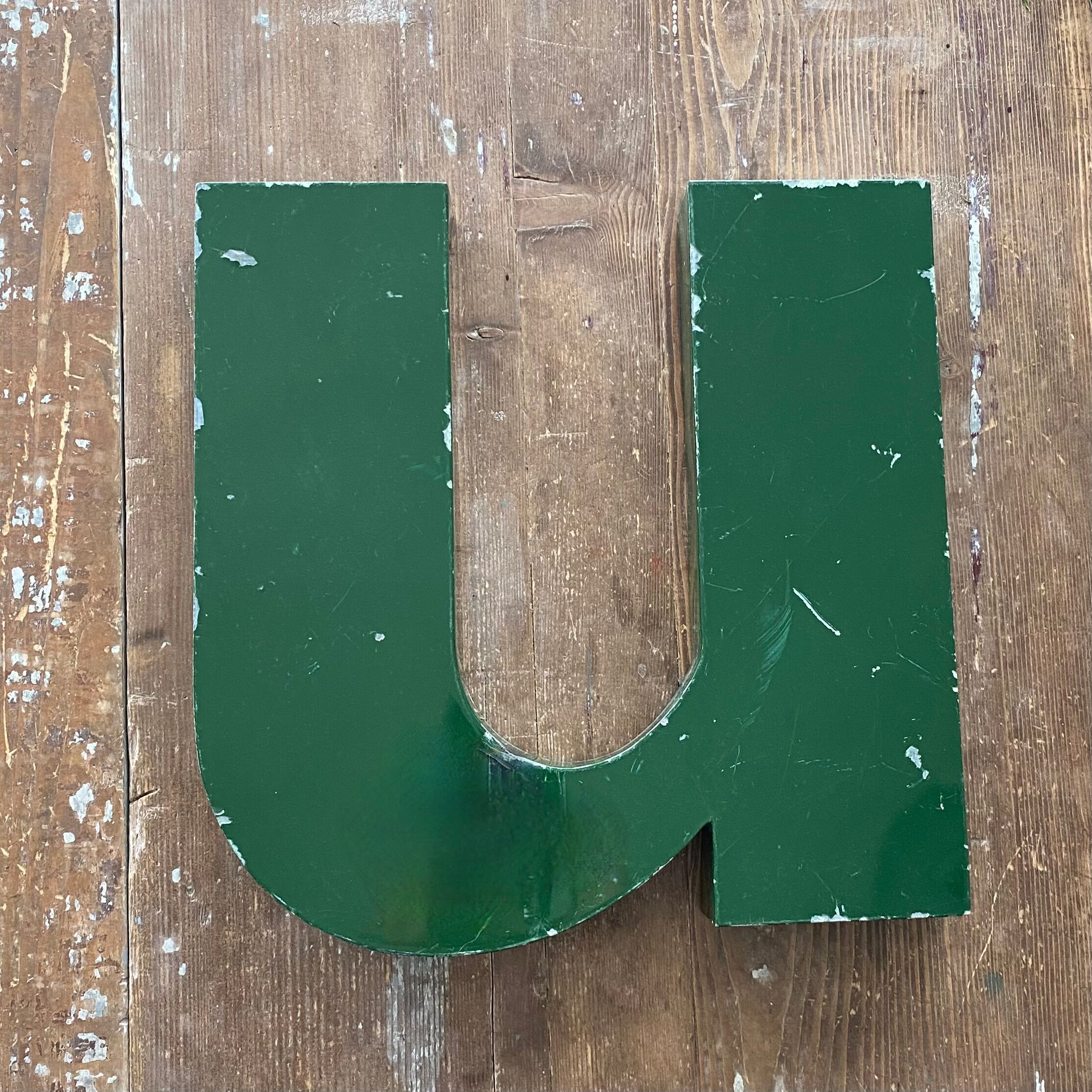 Letter n or u