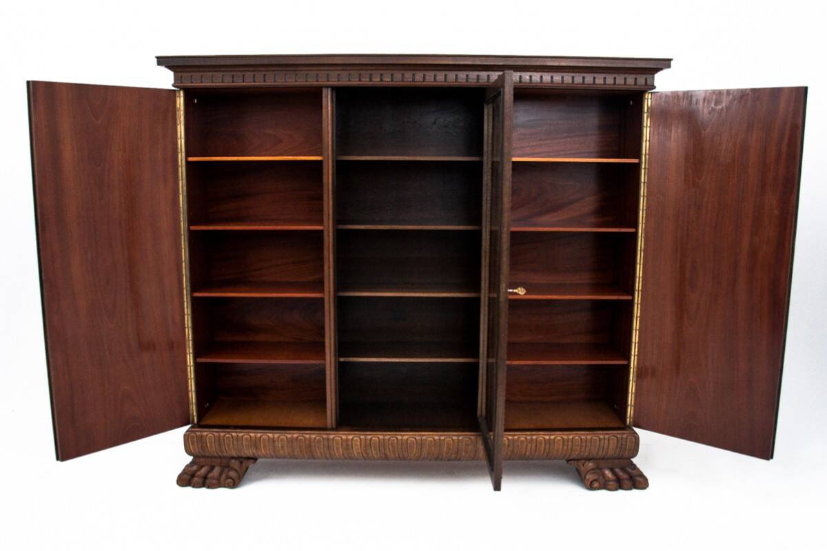 Cabinet set on lion's paws, Germany, early 20th century.