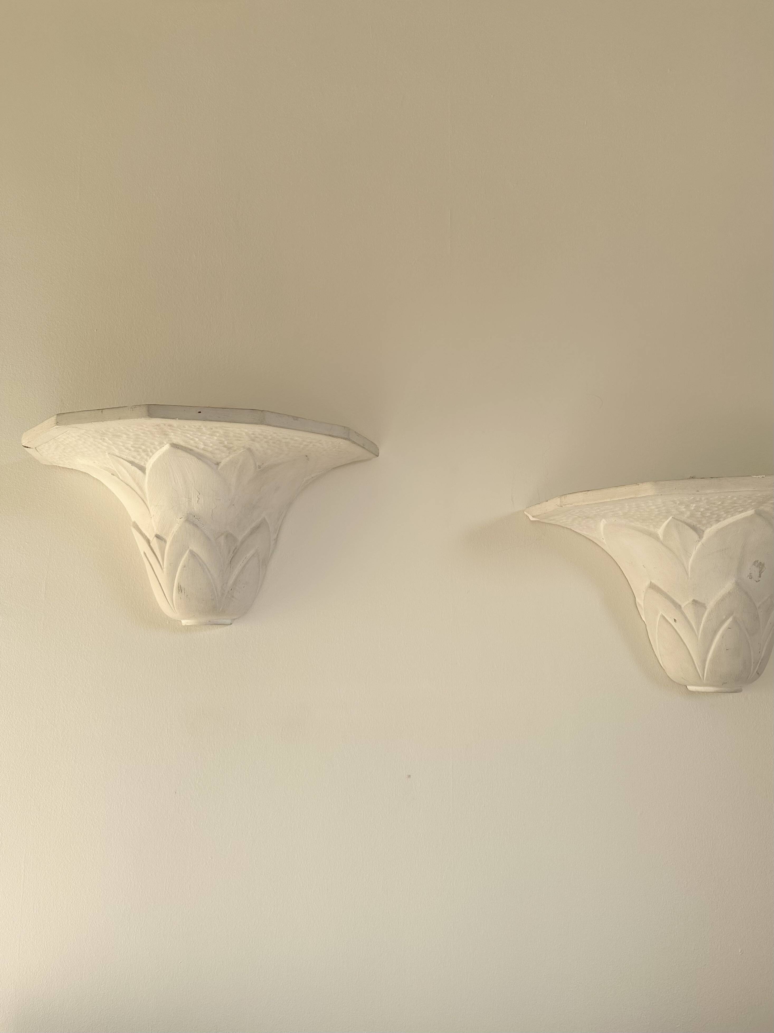 Pair of plaster wall sconces, palmette decoration, 20th century