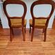 Pair of wooden chairs with velvet seats