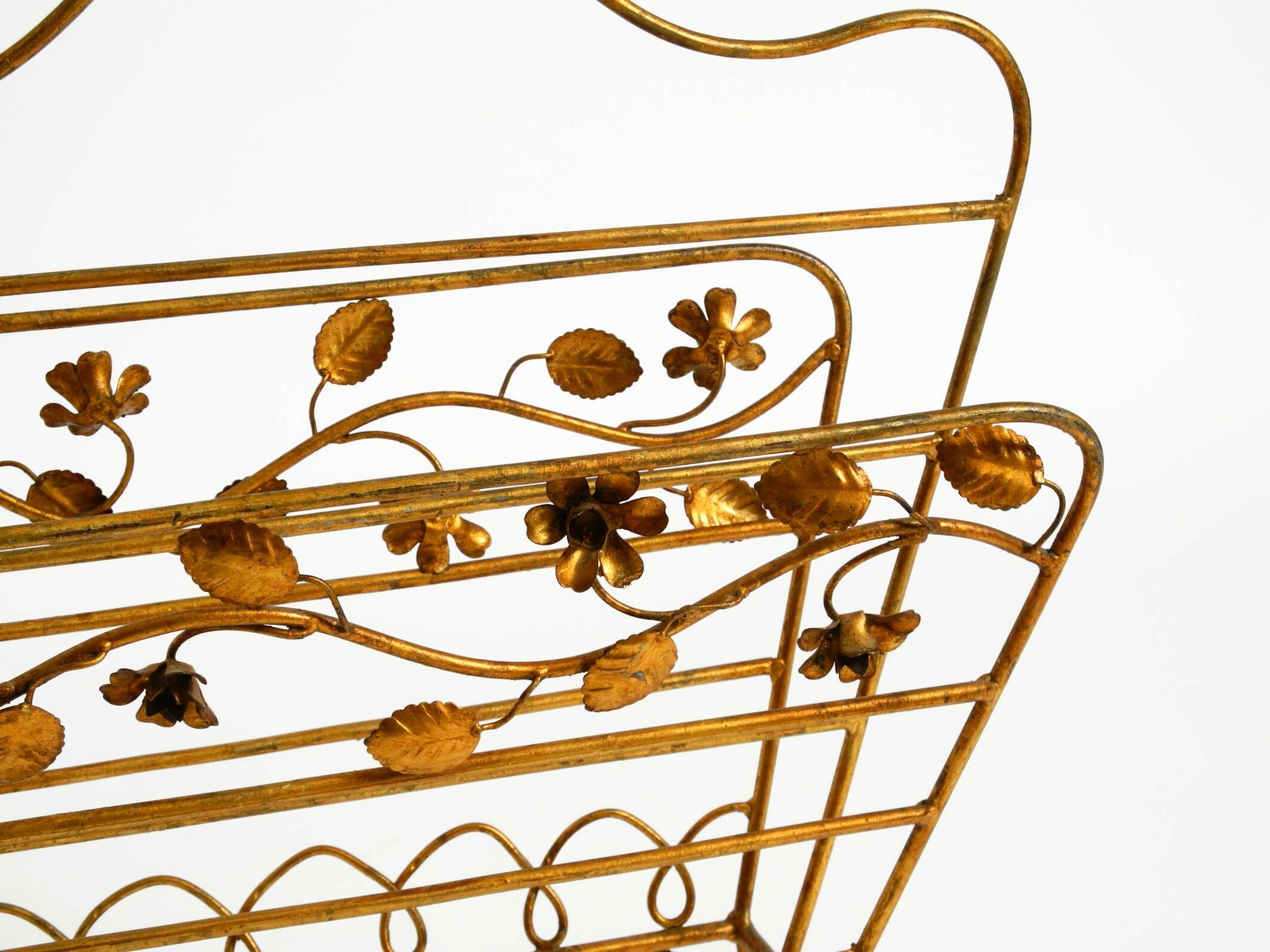 Extraordinary mid-century newspaper and magazine rack with a gilded metal