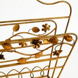 Extraordinary mid-century newspaper and magazine rack with a gilded metal
