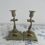 Pair of brass dolphin candlesticks, late 19th century, Napoleonic period