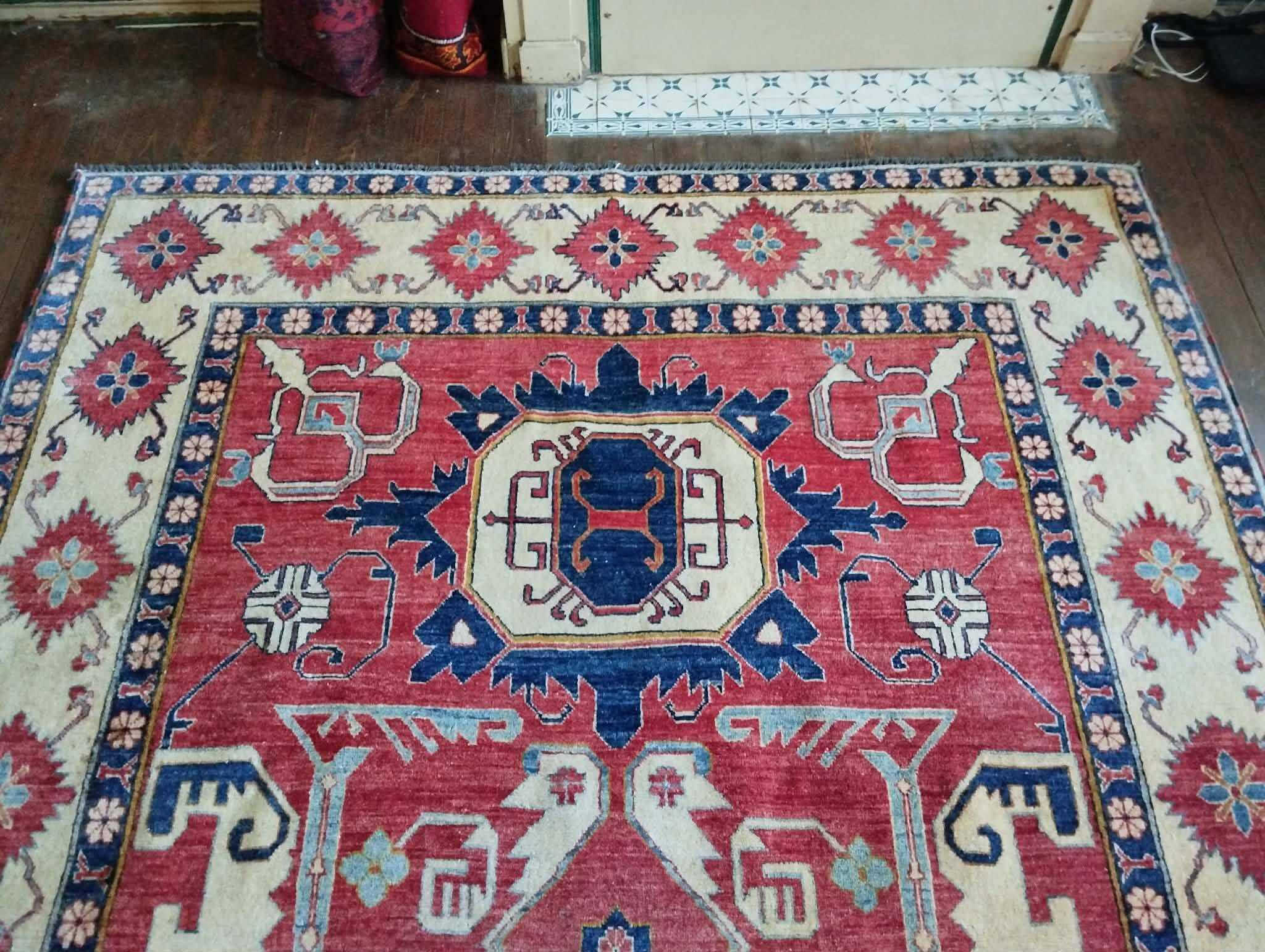 Handmade Pakistani Kazak rug 303x225cm