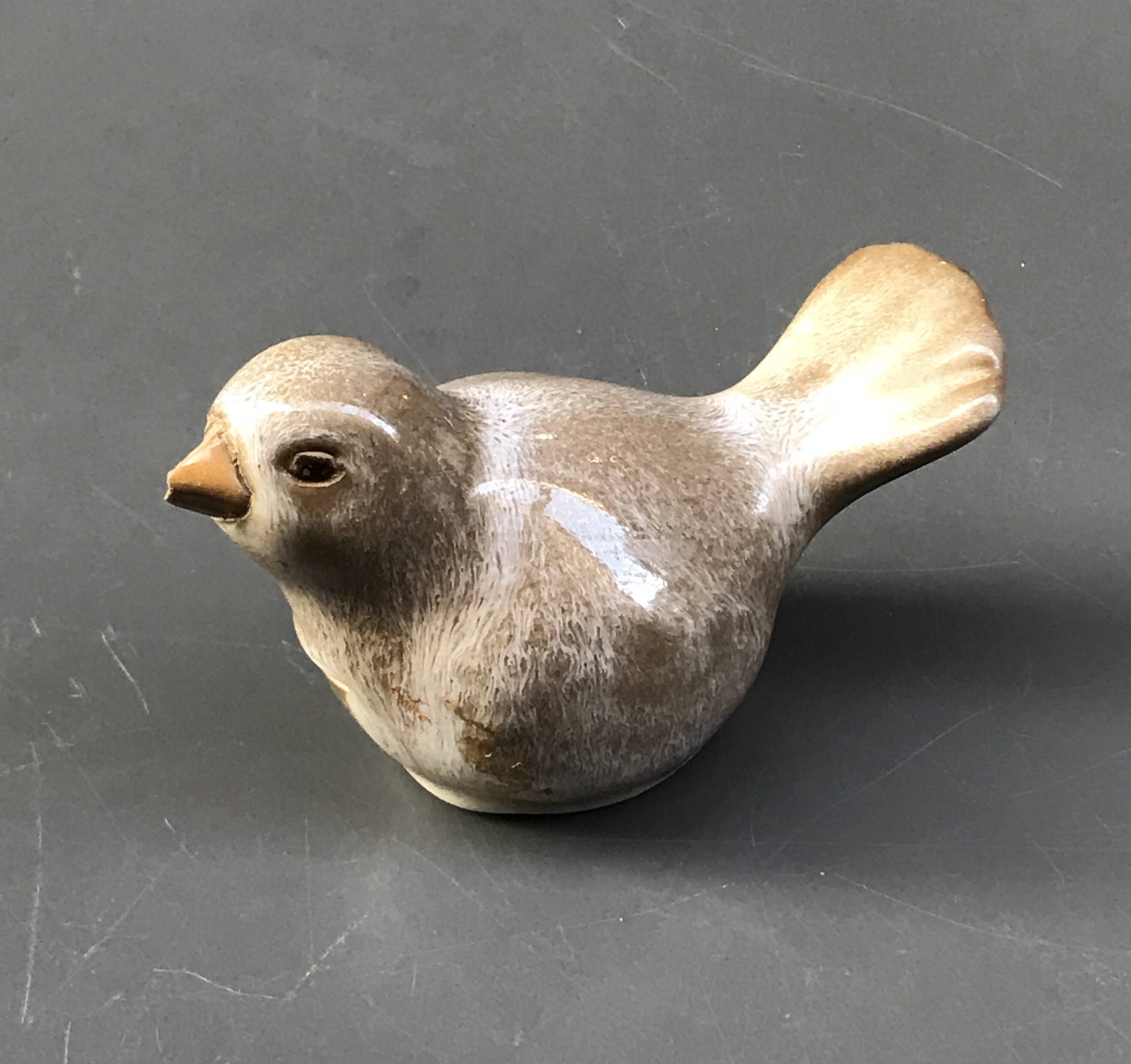 Beige ceramic bird
