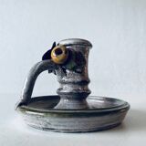 Ceramic candle holder with flower decor