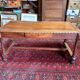 Large antique carved wooden desk in Renaissance style