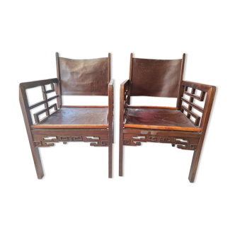 Pair of old Asian Chinese wooden chairs with leather seat