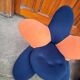 Pair of Lily chairs from the 1990s in blue and coral velvet, postmodern sculptural silhouette.