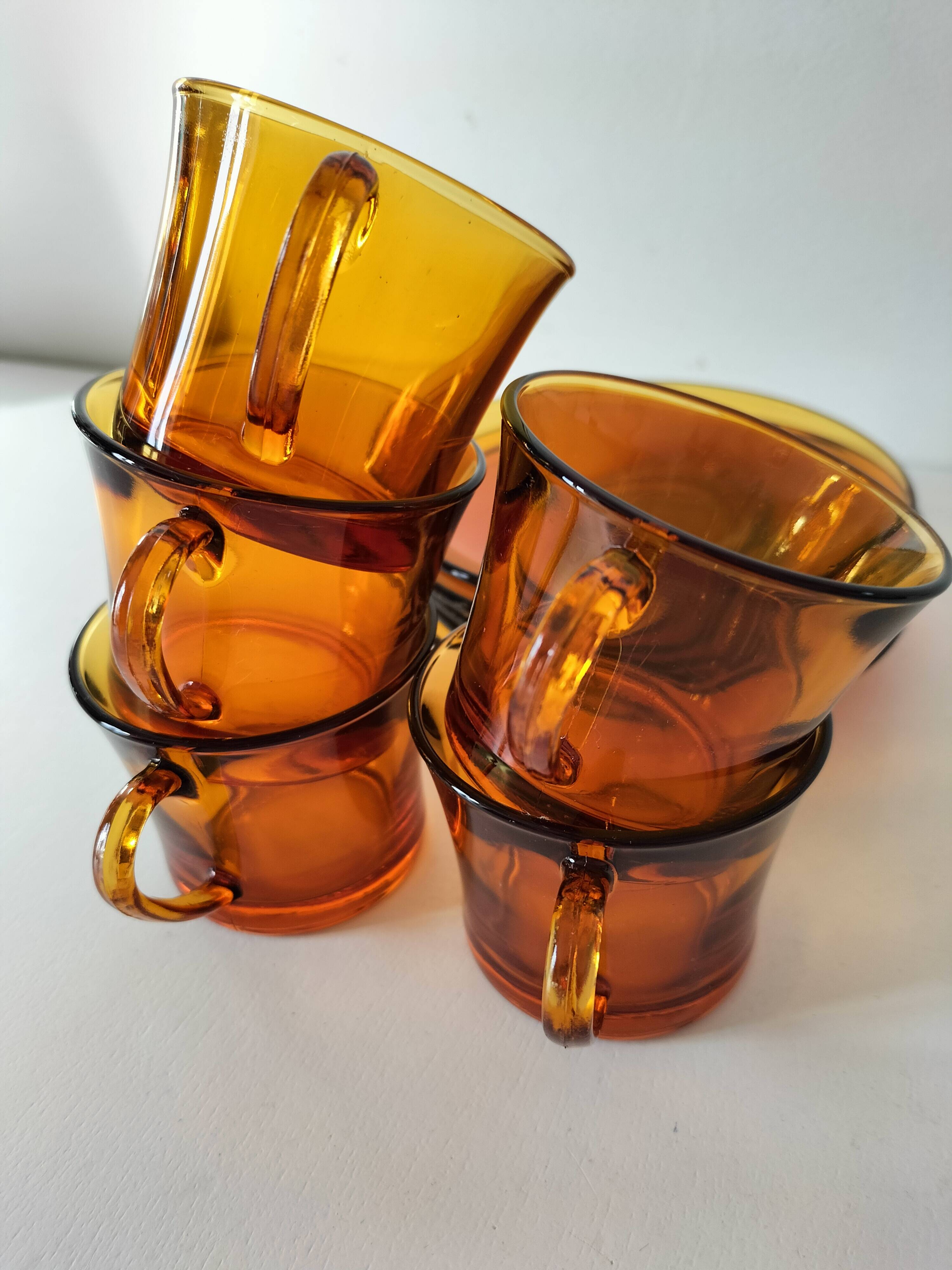 5 vintage amber Duralex cups and saucers