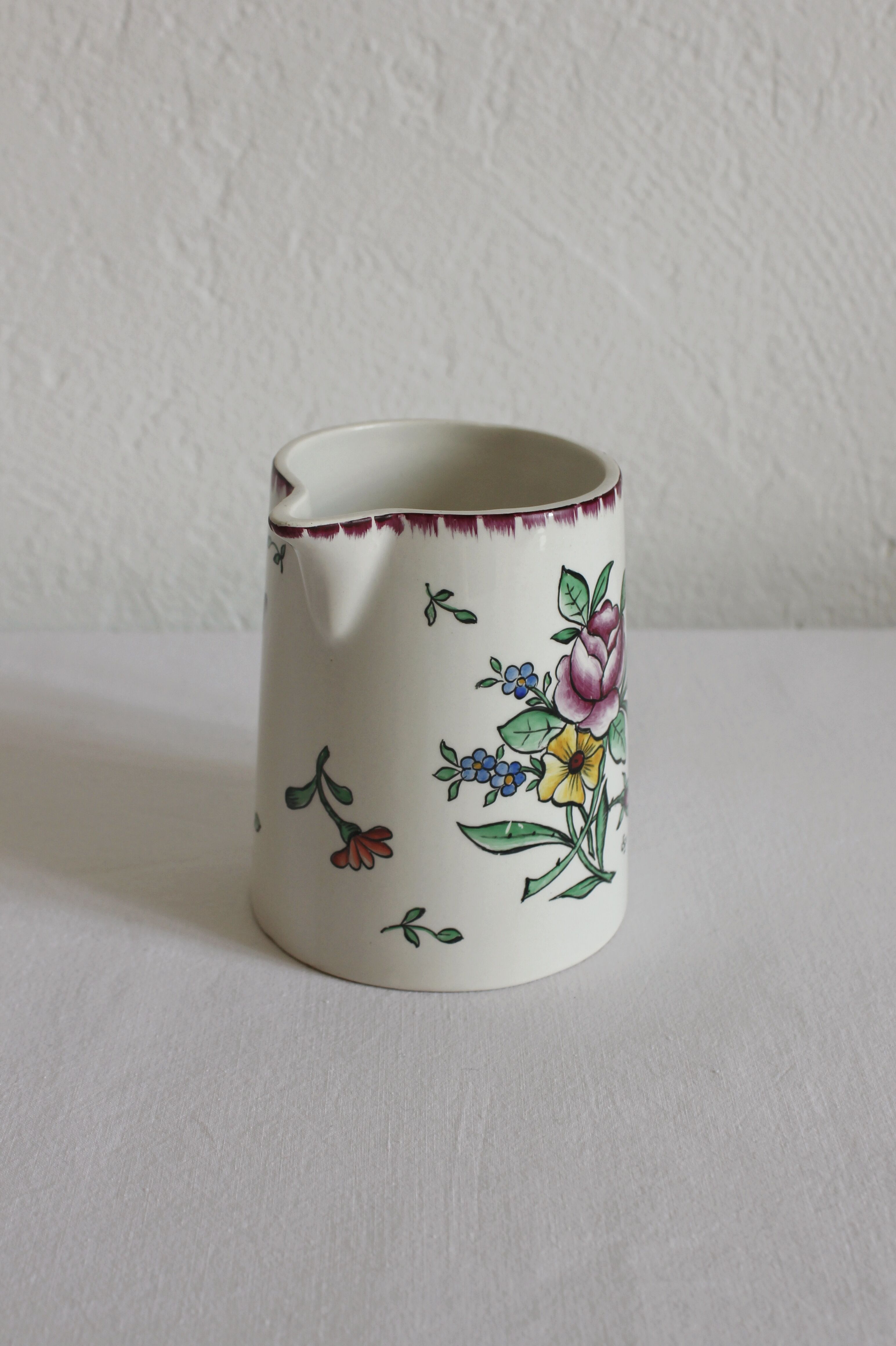 Earthenware jug with floral decoration from Digoin Sarreguemines.
