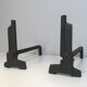 Pair of modernist chenets in cast iron and iron