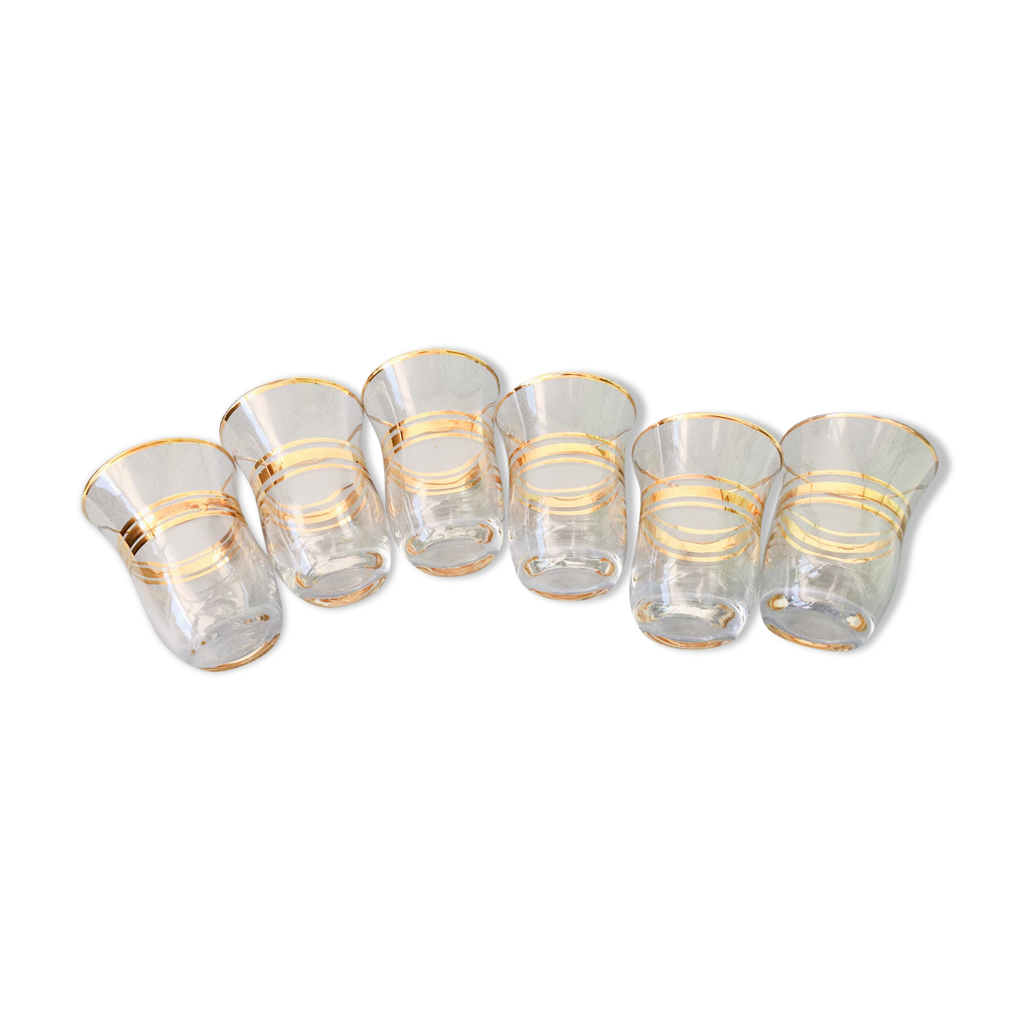 Six glasses of vintage alcohol cups