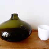 Small dark green handmade glass ball vase