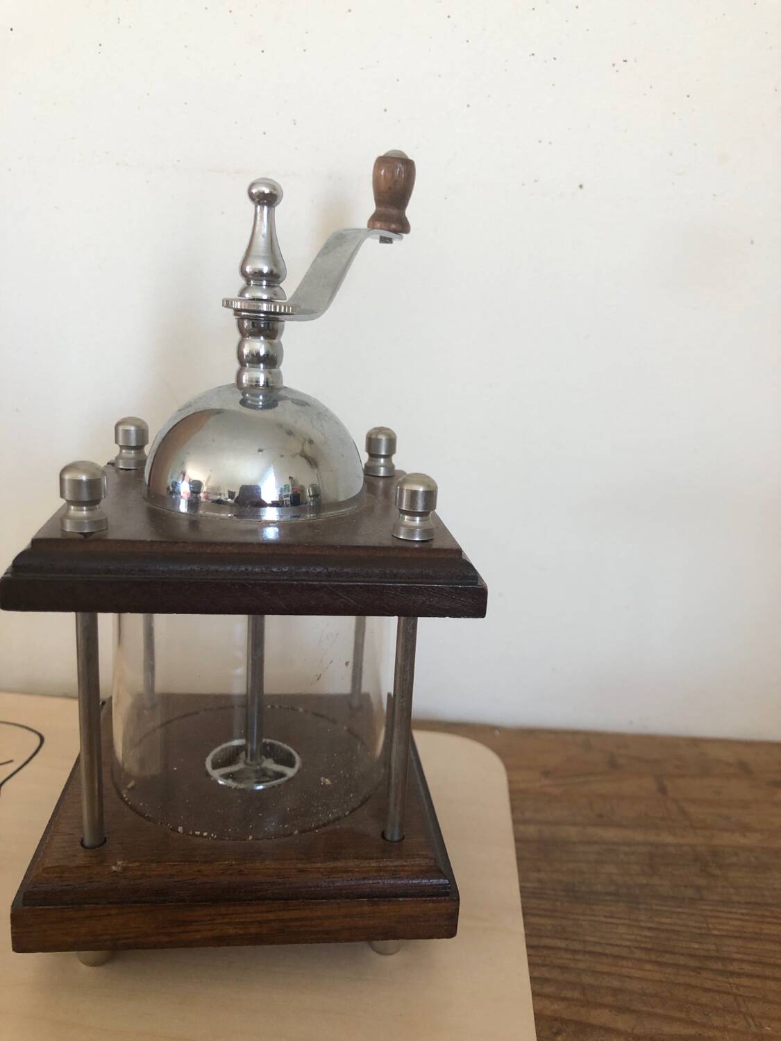 Small old manual pepper or spice mill