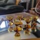 5 verres à pied ambré, années 60
