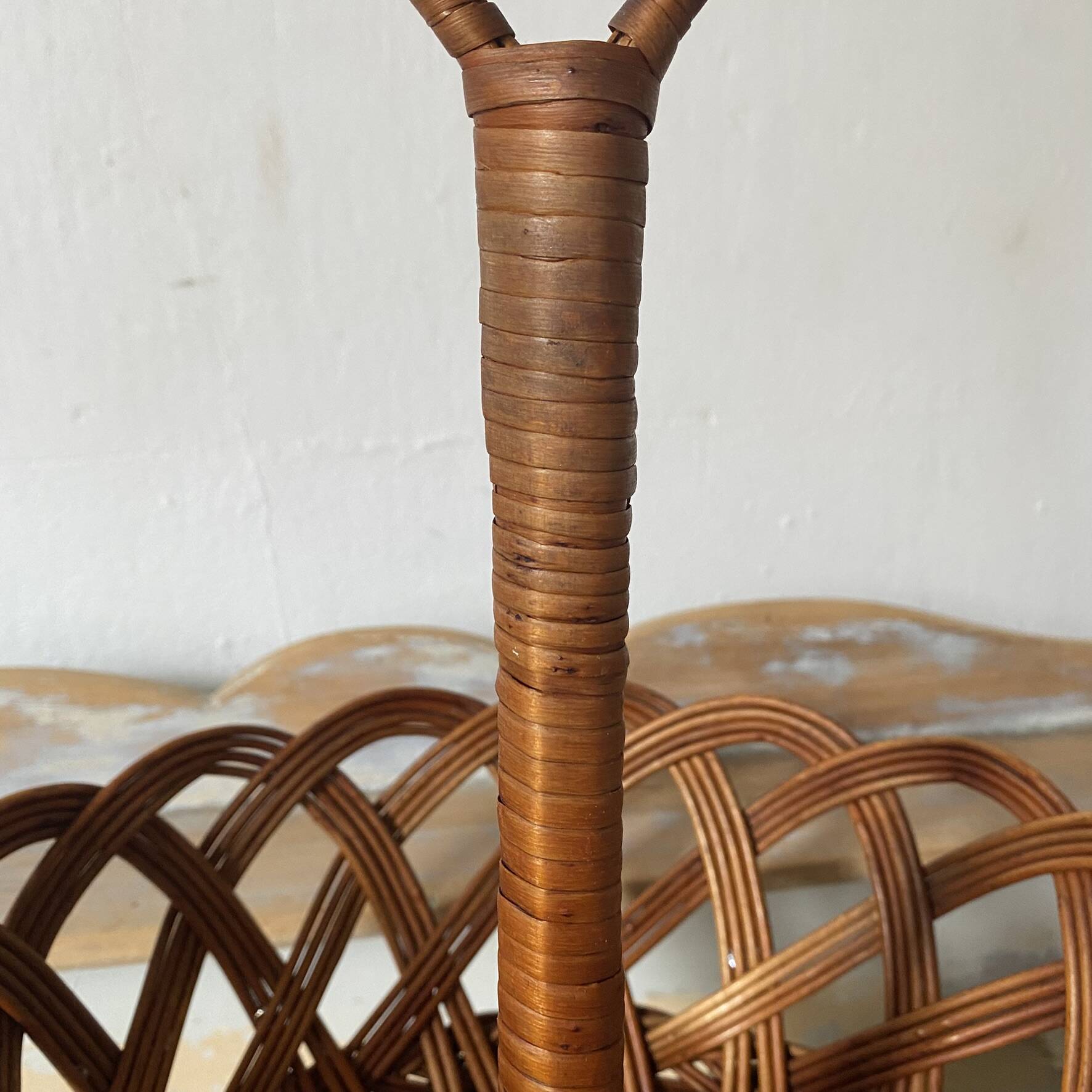 Wicker fruit bowl on a stand