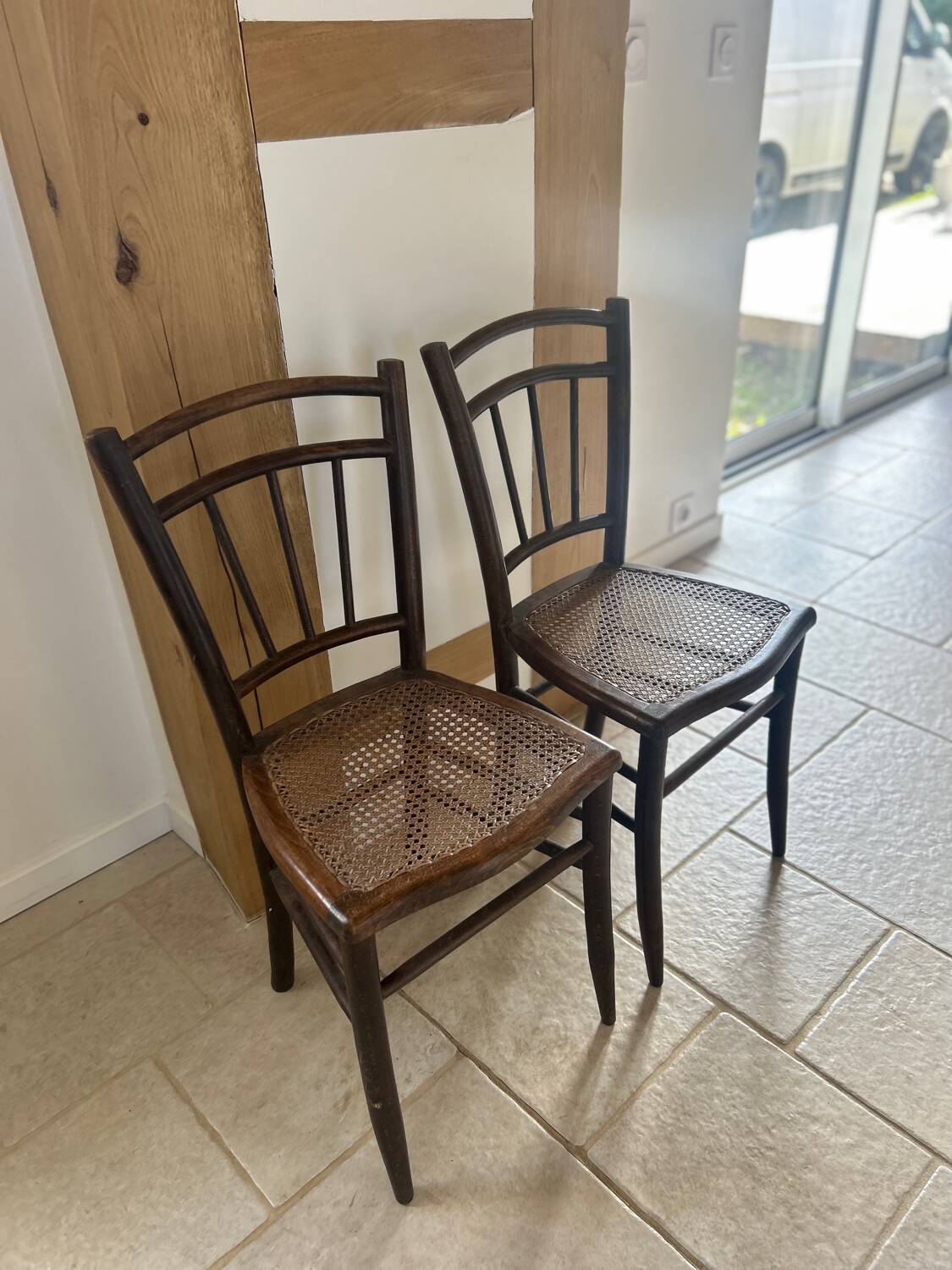 Pair of cane bistro chairs