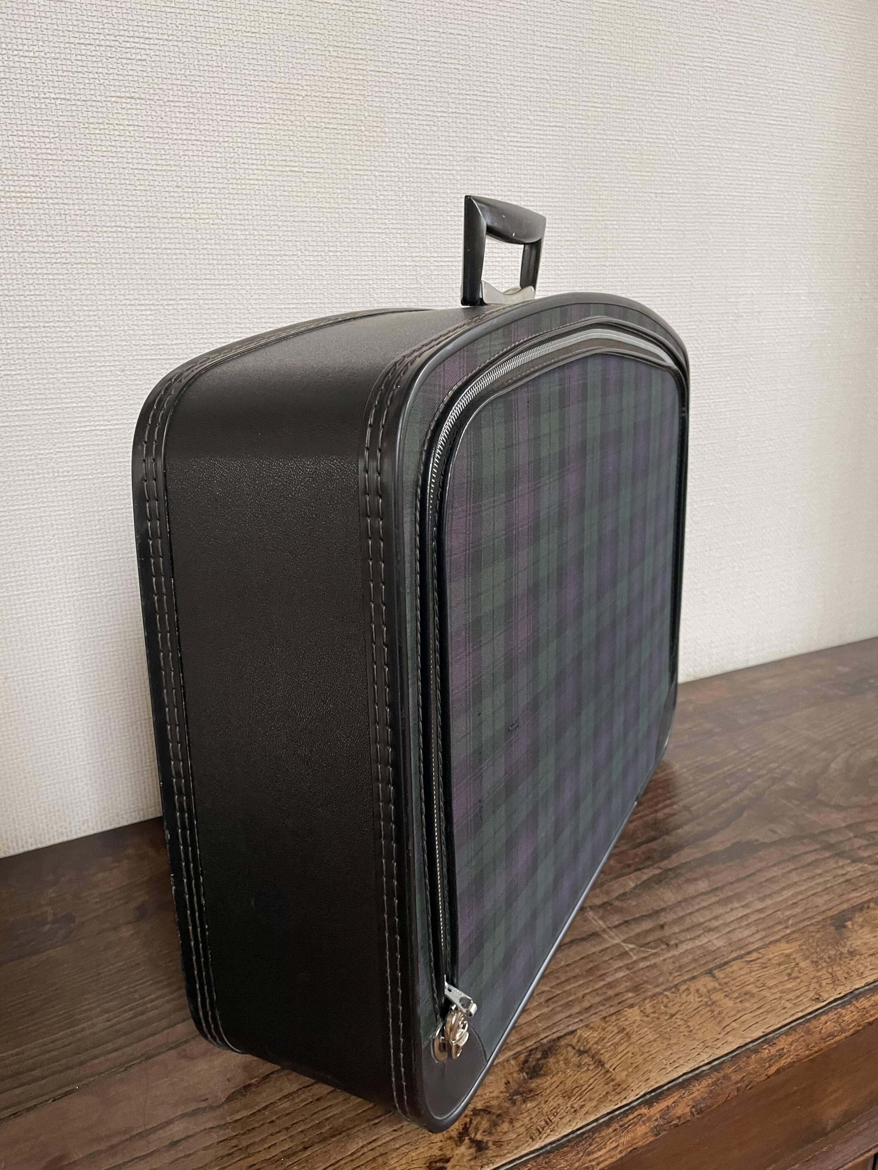 Tartan check suitcase