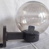 Delmas globe “smoked” wall lamp
