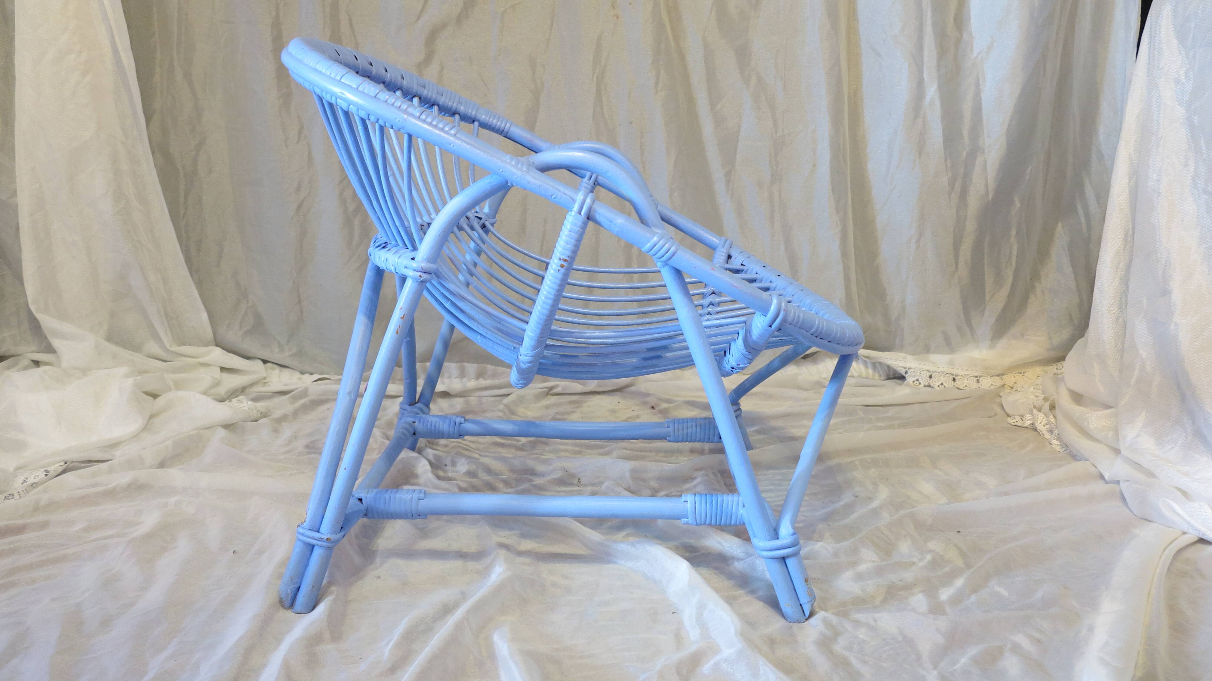 Blue painted rattan armchair