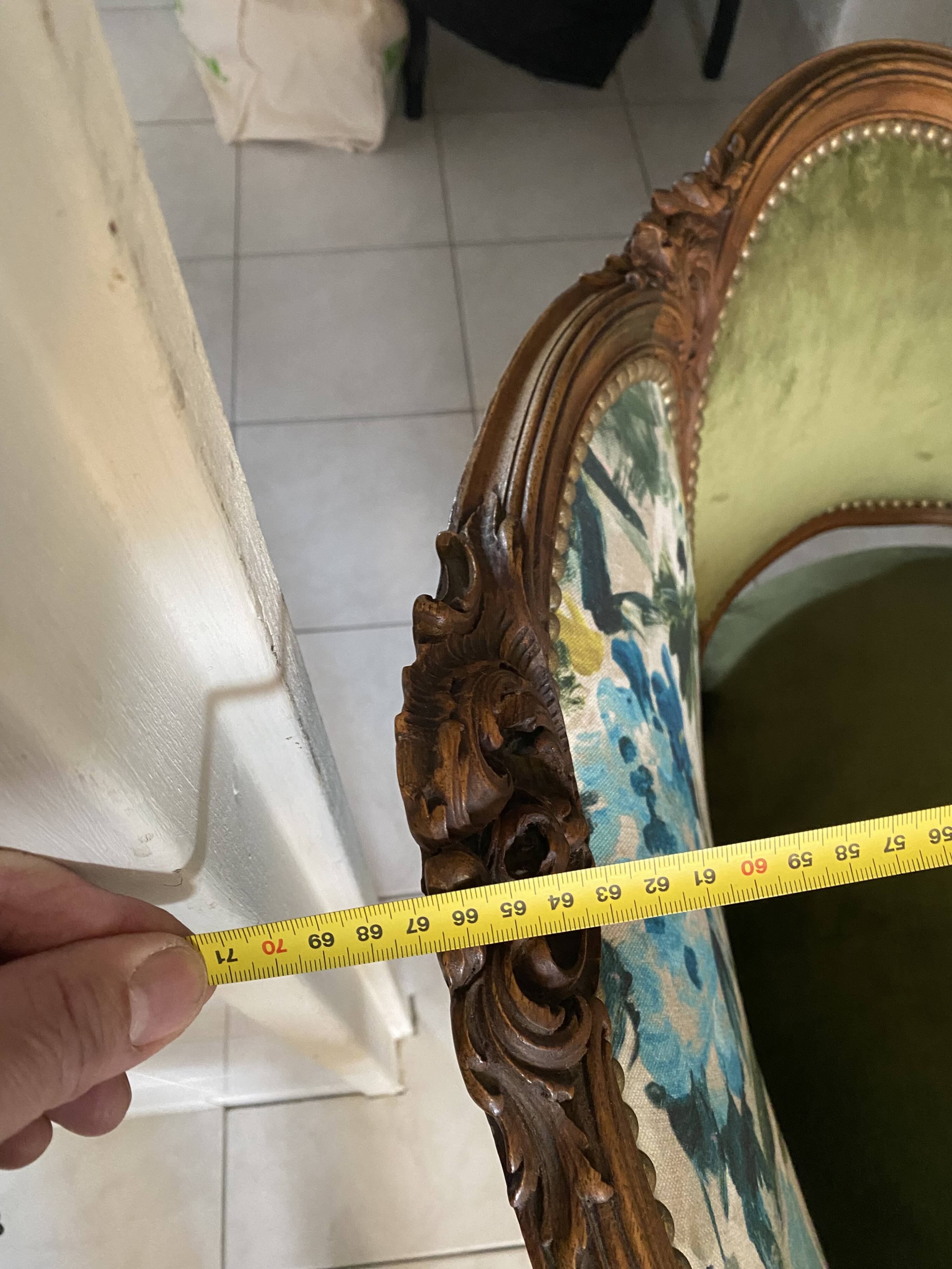 Paire de fauteuils en bois sculpté, XXème s.
