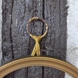 Round gilded glass frame