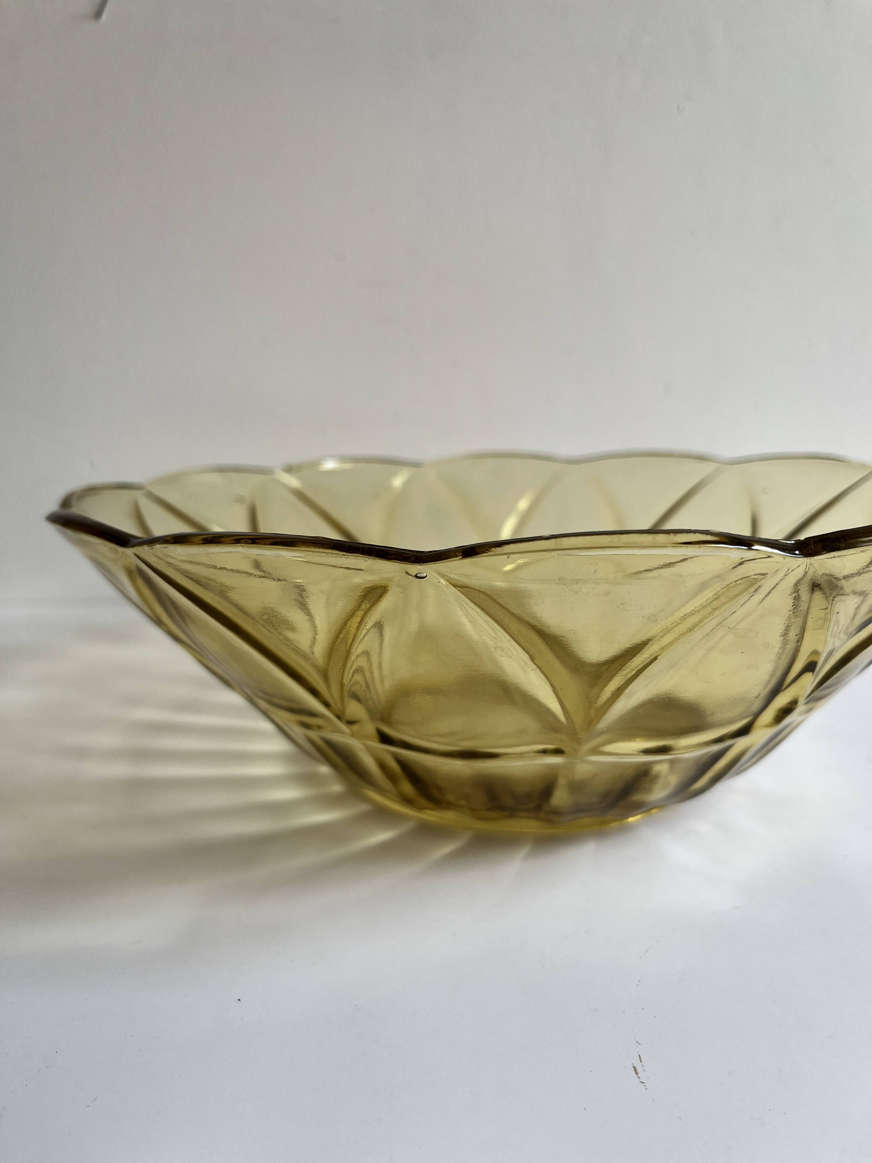 Yellow glass salad bowl