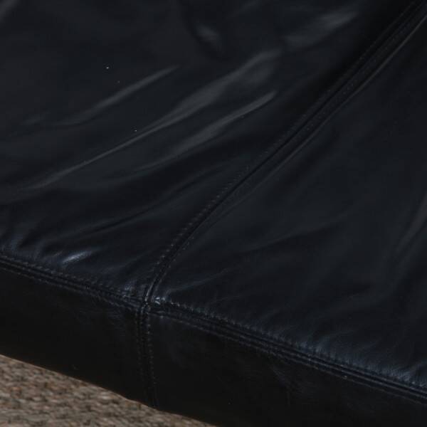 Two-seater leather banquette from the 1980s.