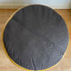 2 poufs moutarde patchwork en cuir de Sède