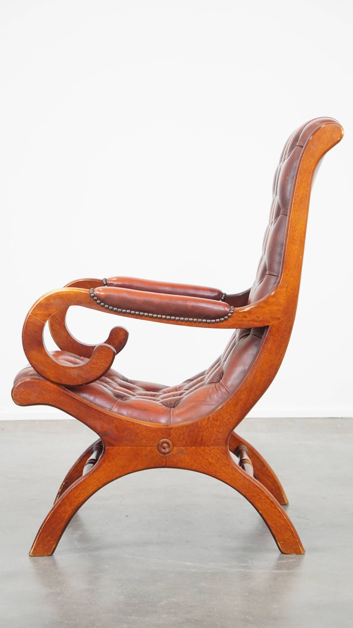 Red cowhide leather English Chesterfield armchair combined with wood