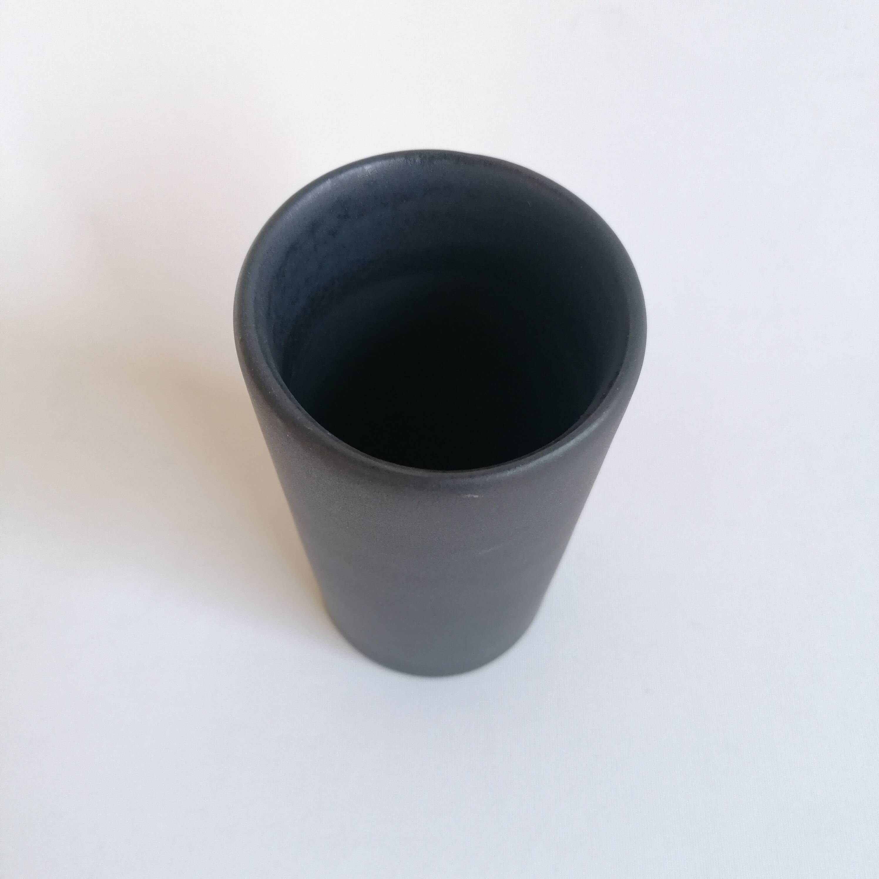 Matte black scroll vase by Antonio Lampecco